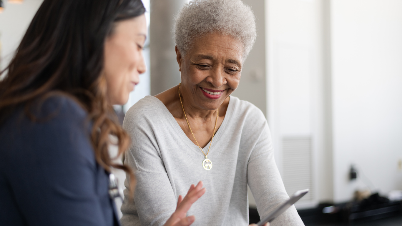 a women approaching retirement and asking a financial advisor questions