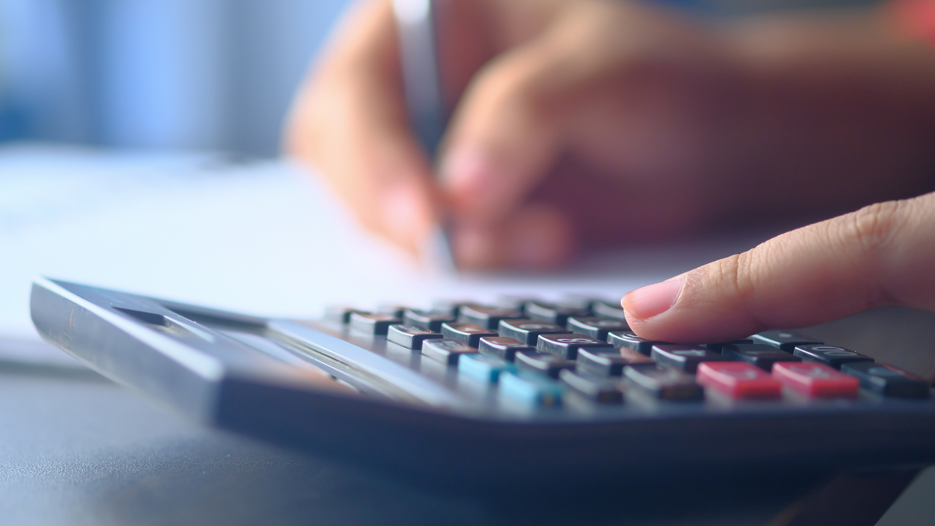 a person using a calclulator