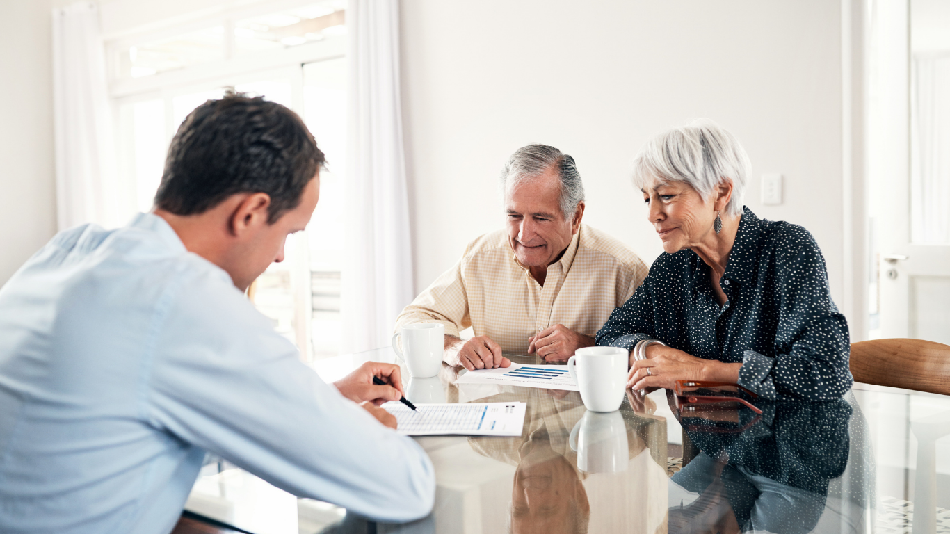 an older couple with a retirement advisor